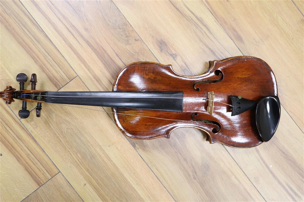 A 19th century Flemish? violin, length of back 35cm, cased with two bows